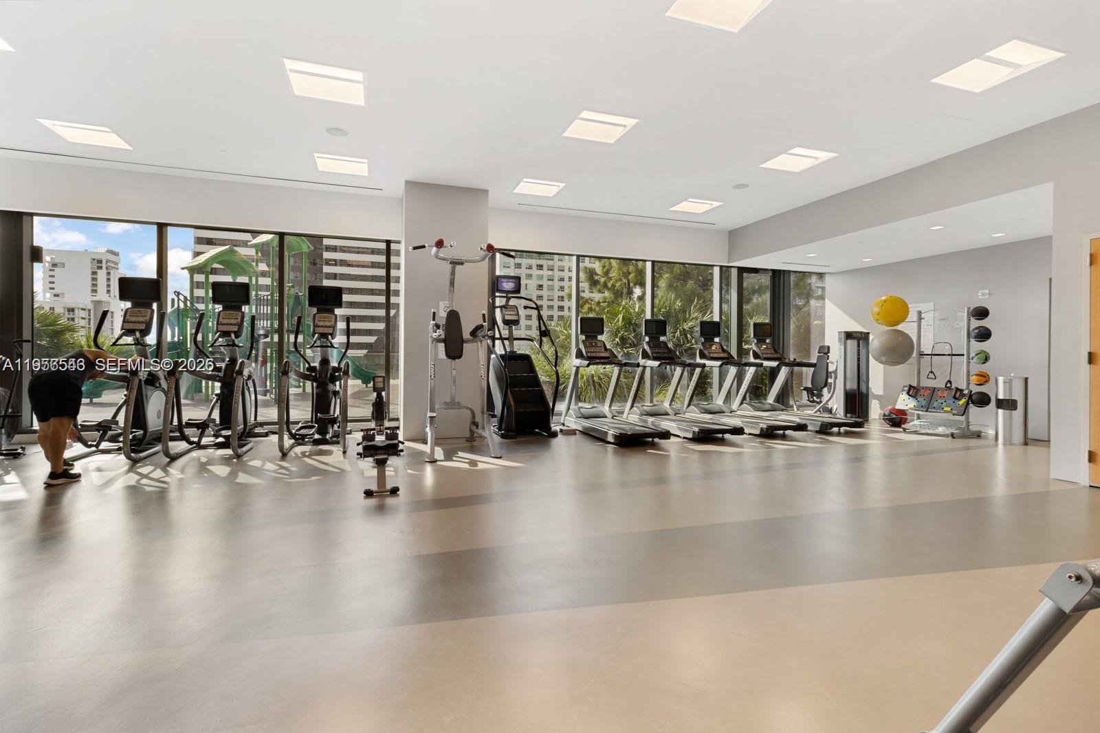 88 Southwest 7th Street, Unit 2104 Miami, FL 33130 - Photo 31 of 50 a view of a room with gym equipment