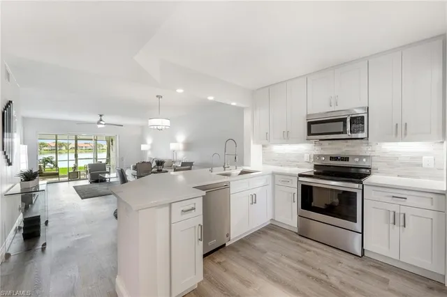 a view of washer and dryer in a utility room