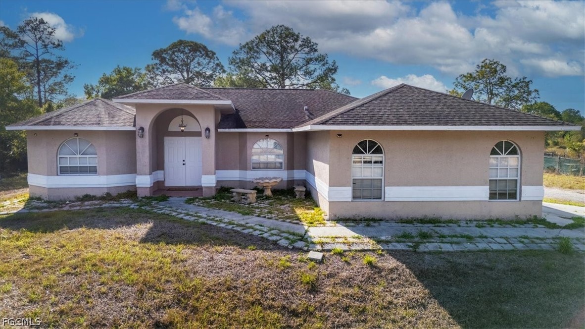 a front view of house with yard