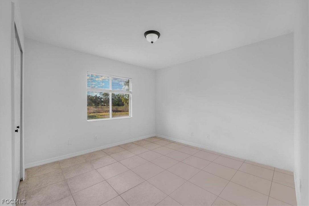 430 South Datil Street Clewiston, FL 33440 - Photo 27 of 33 an empty room with a window
