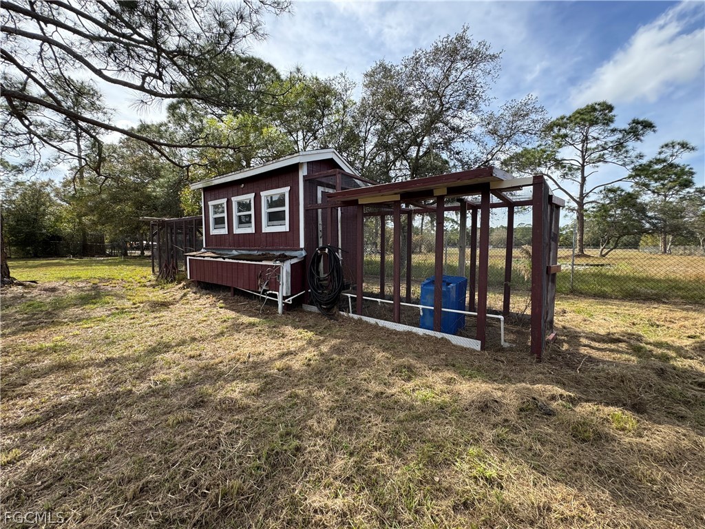 430 South Datil Street Clewiston, FL 33440 - Photo 31 of 33 a view of a house with a yard