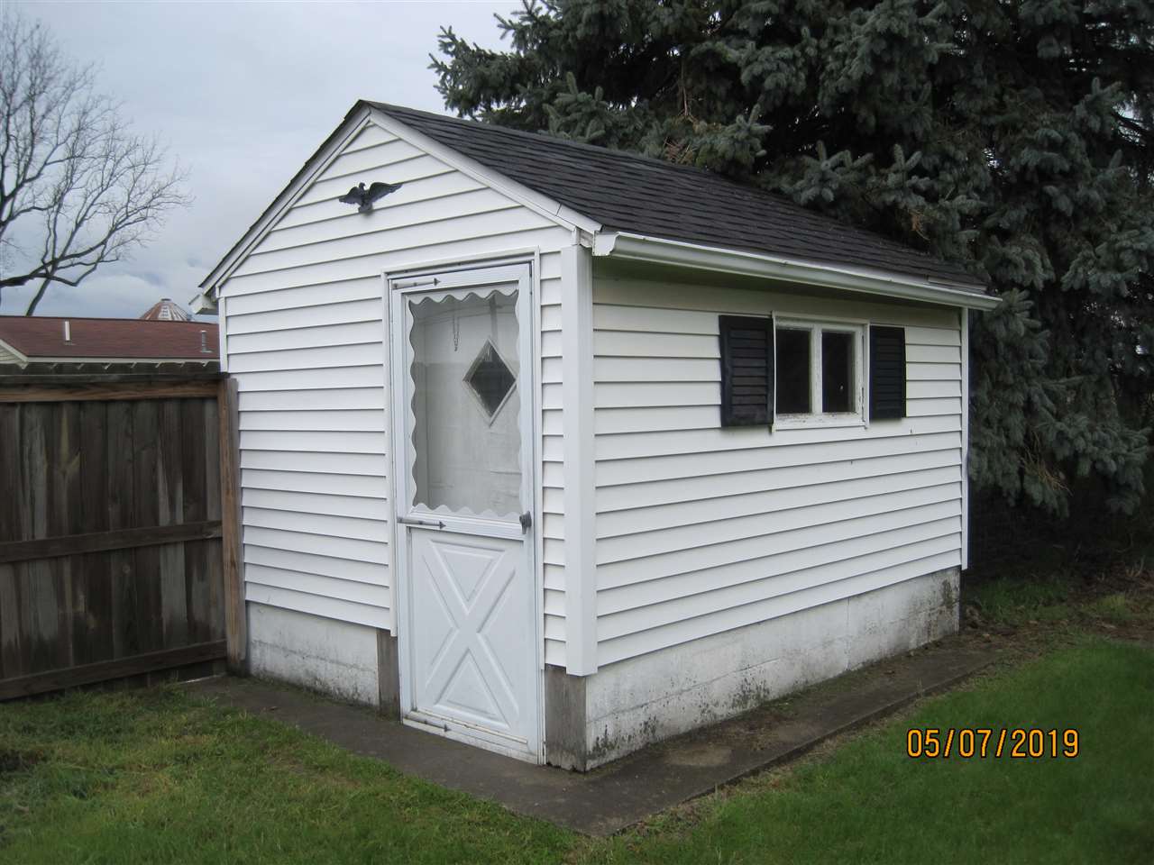 21751 24 Mile Road Macomb, MI 48042 - Photo 12 of 28 shed w/concrete floor