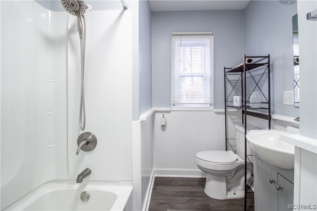 2125 Burgess Road Chester, VA 23836 - Photo 19 of 39 a white toilet sitting next to a bathroom sink