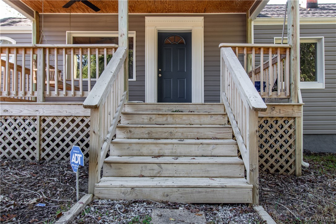2125 Burgess Road Chester, VA 23836 - Photo 27 of 39 a view of entryway with wooden floor and a front door
