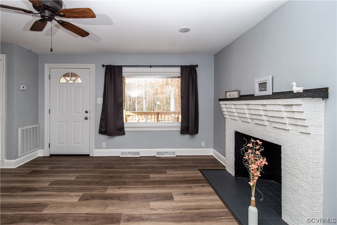 2125 Burgess Road Chester, VA 23836 - Photo 6 of 39 a living room with furniture and a fireplace