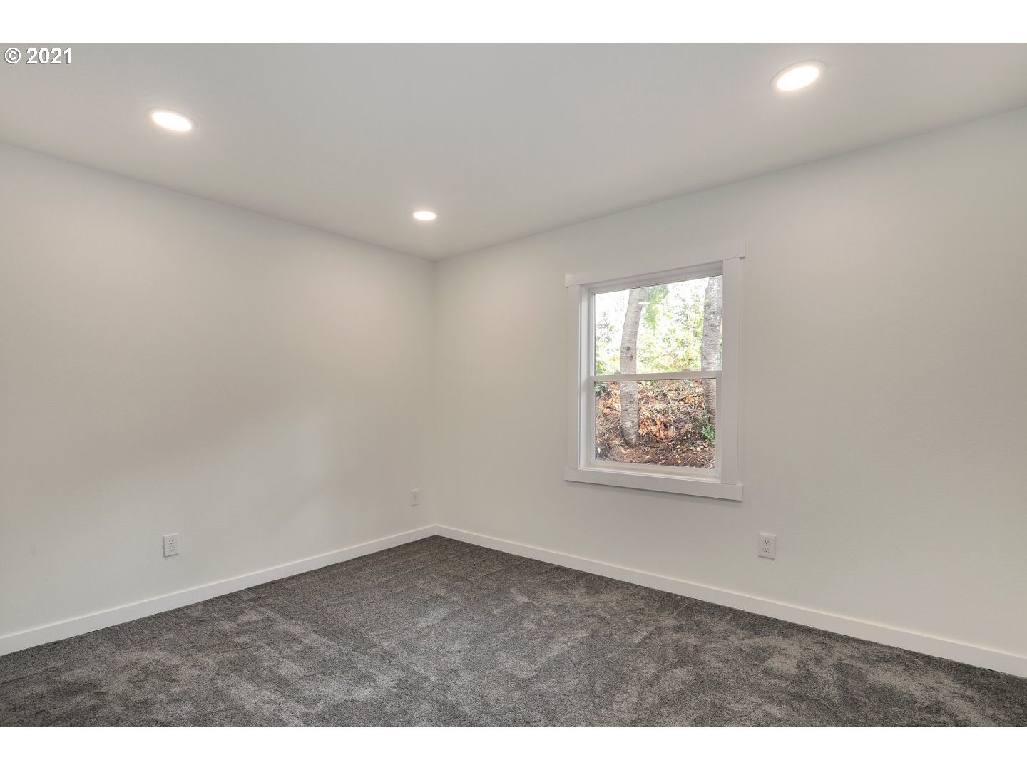 817 Highland Street Ridgefield, WA 98642 - Photo 14 of 27 a view of an empty room and window