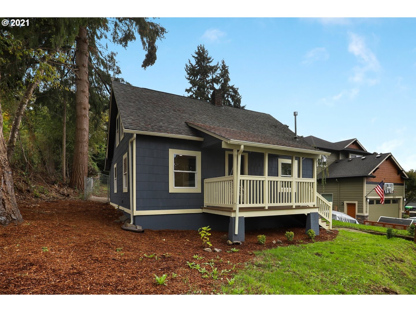 817 Highland Street Ridgefield, WA 98642 - Photo 3 of 27 a front view of a house with a yard