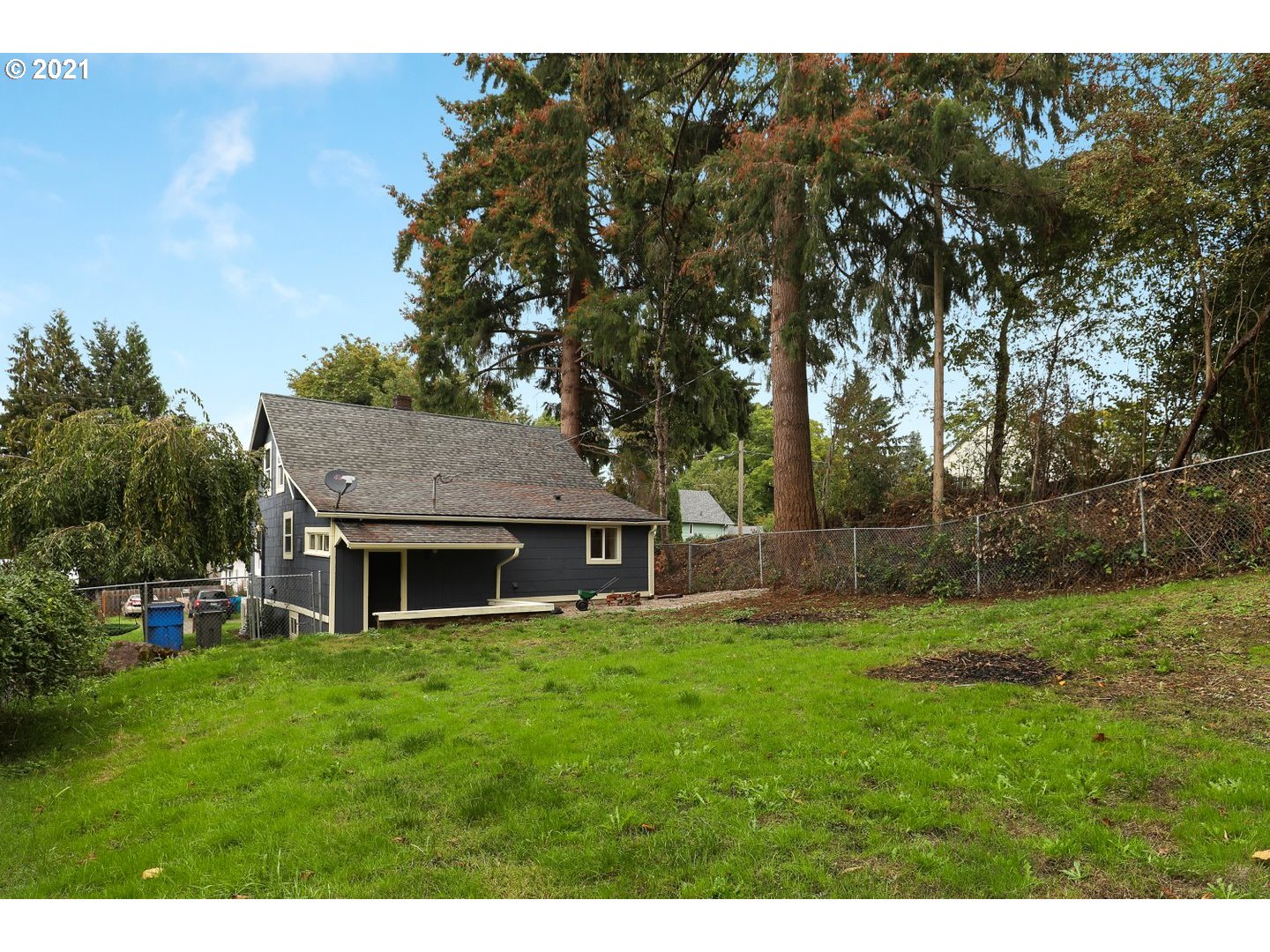 817 Highland Street Ridgefield, WA 98642 - Photo 26 of 27 a view of a house with a yard