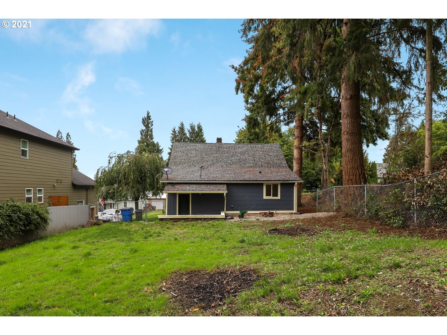 817 Highland Street Ridgefield, WA 98642 - Photo 27 of 27 a view of a house with a yard porch and sitting area