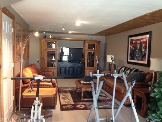 7546 West Sherwood Road Fowlerville, MI 48836 - Photo 26 of 32 Another view of finished walk out