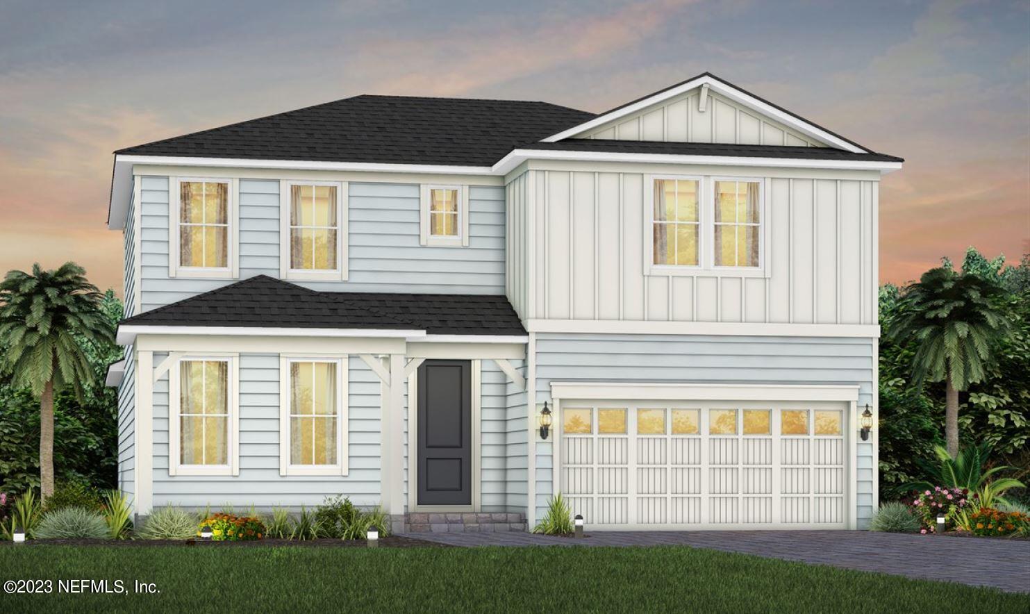 306 Shortleaf Lane Yulee, FL 32097 - Photo 2 of 35 a front view of a house with a yard