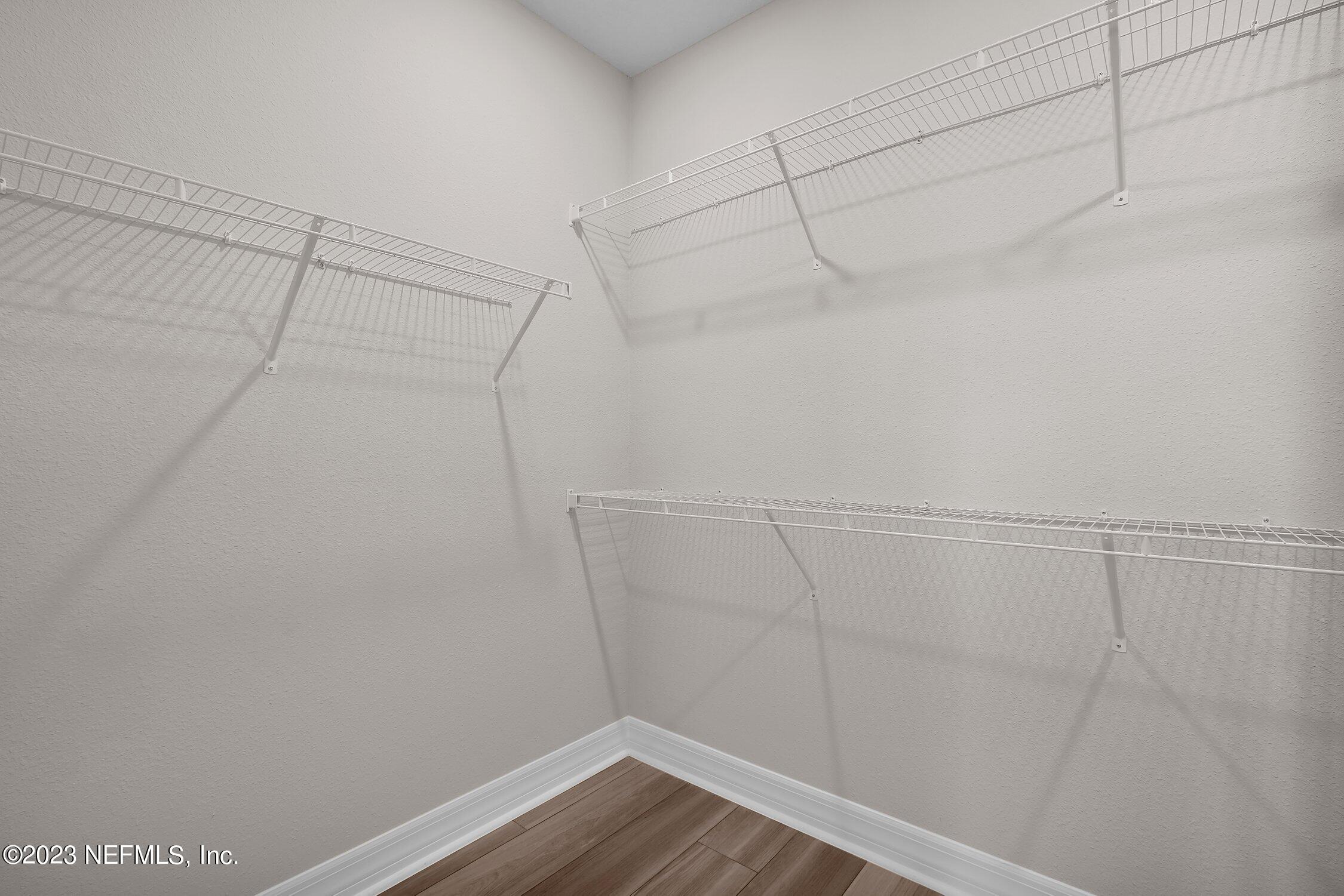 306 Shortleaf Lane Yulee, FL 32097 - Photo 21 of 35 a view of a room with racks on the wall