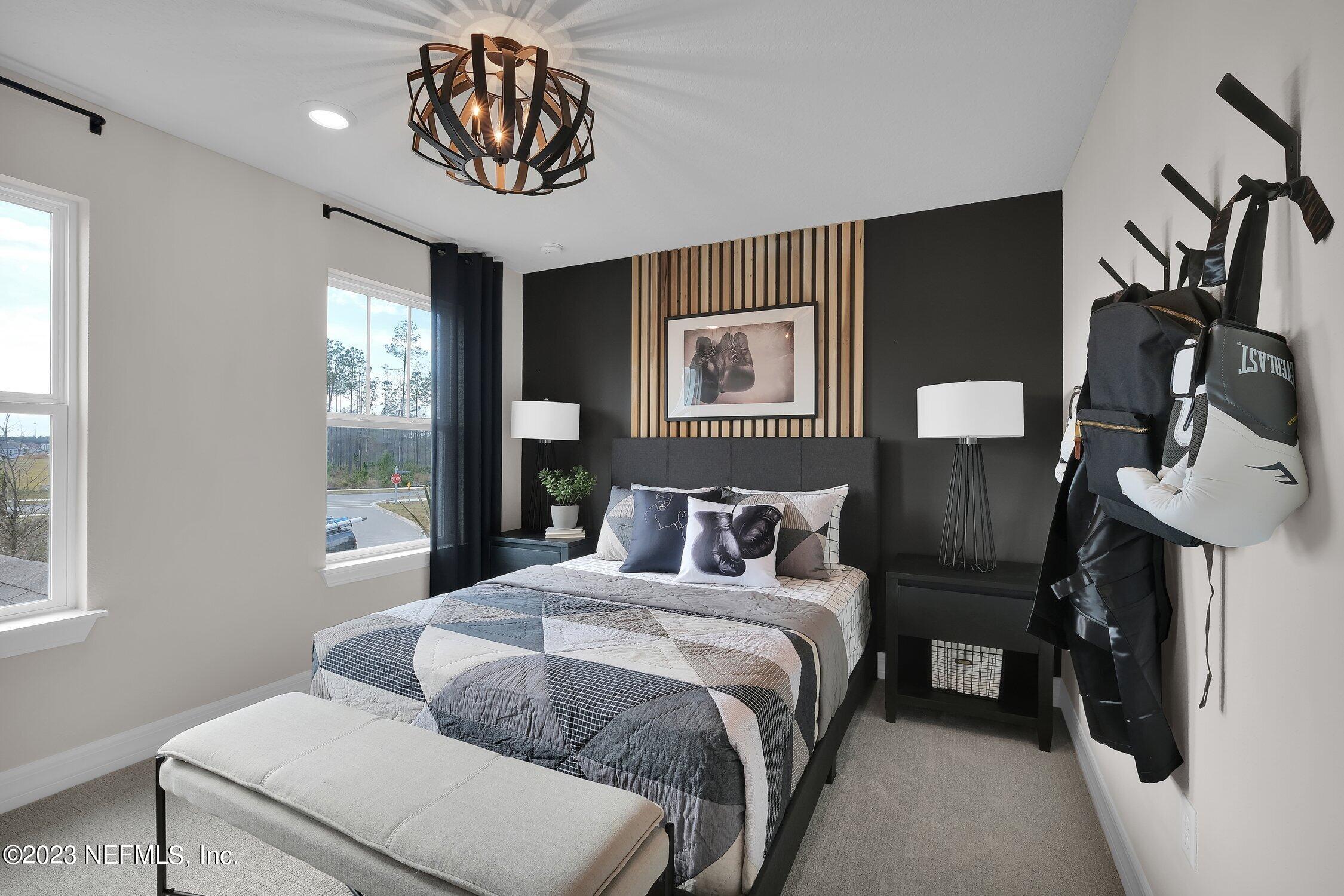 306 Shortleaf Lane Yulee, FL 32097 - Photo 26 of 35 a bedroom with bed and window