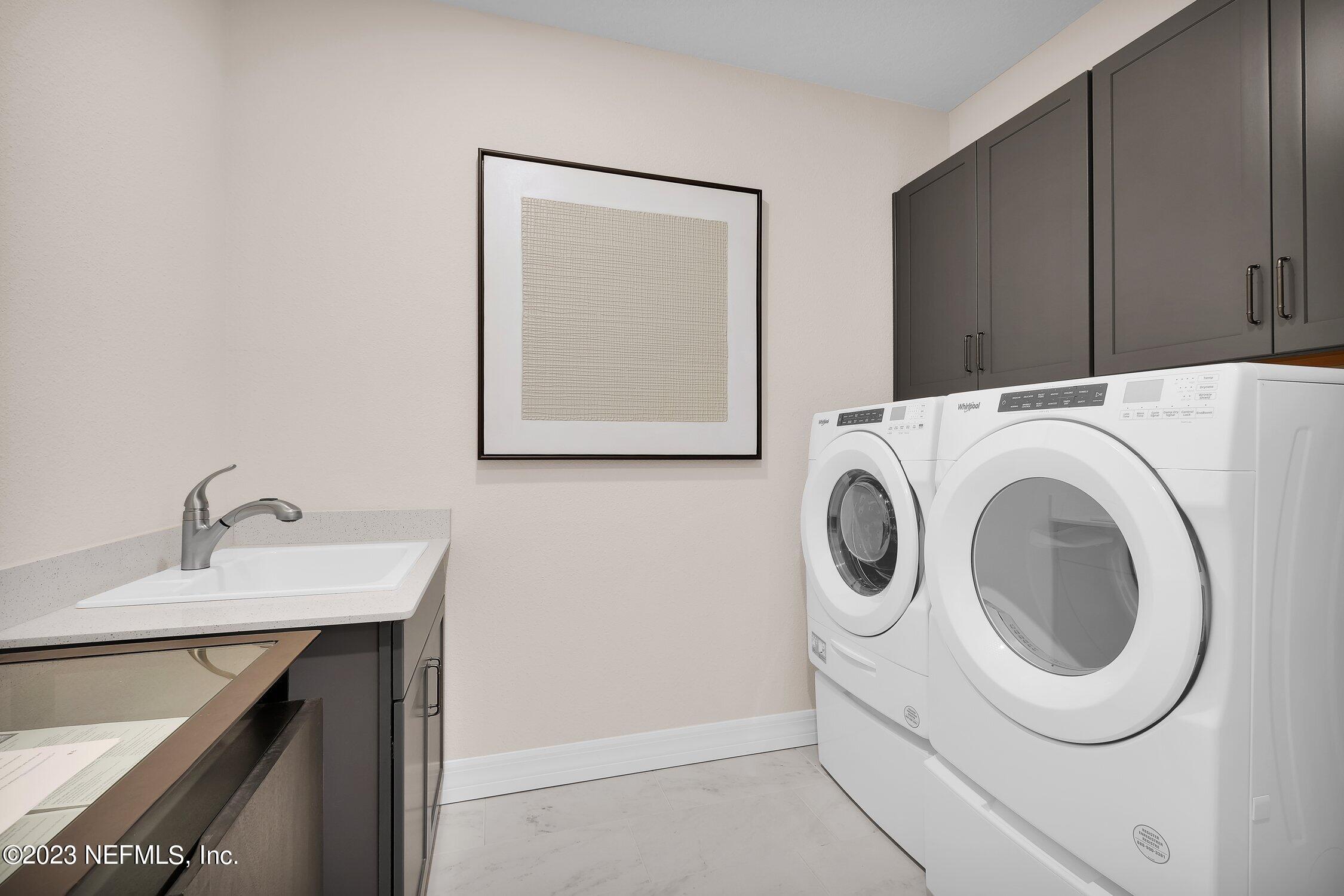 306 Shortleaf Lane Yulee, FL 32097 - Photo 29 of 35 a utility room with dryer and washer