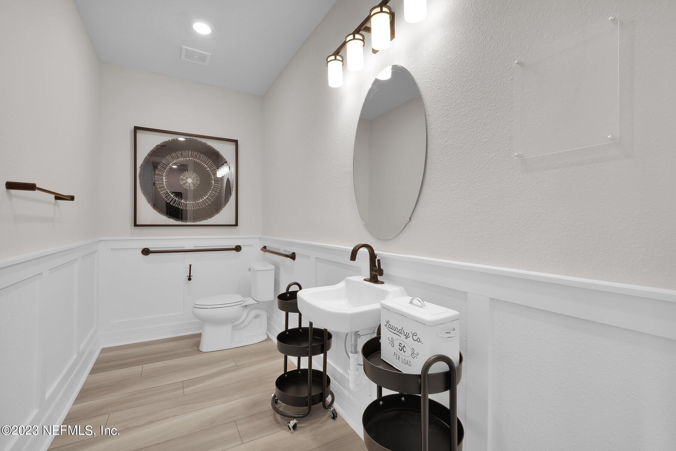 306 Shortleaf Lane Yulee, FL 32097 - Photo 8 of 35 a bathroom with a sink and a mirror