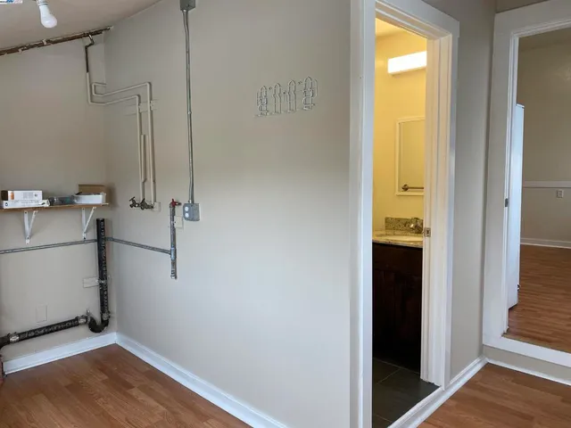 a view of a bathroom with a tub and shower