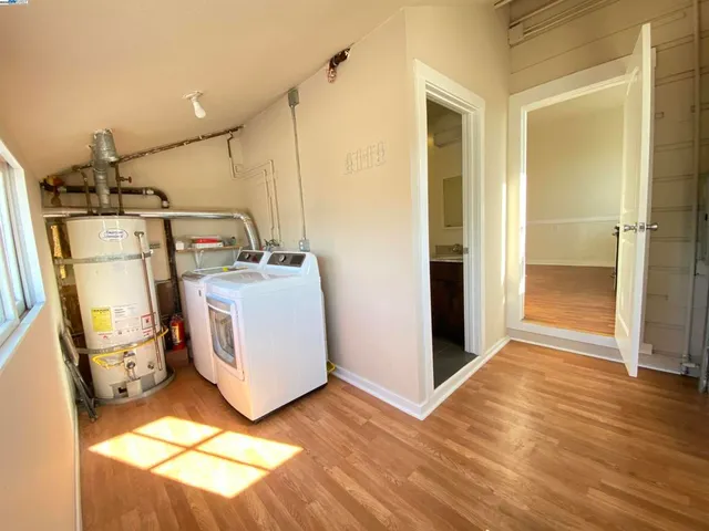 a view of a storage & utility room with washer and dryer