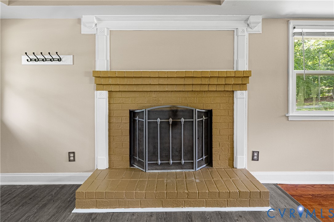 3179 Sandy Hook Road Sandy Hook, VA 23153 - Photo 12 of 36 a view of a livingroom with entryway and a fireplace