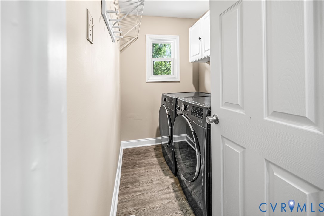 3179 Sandy Hook Road Sandy Hook, VA 23153 - Photo 25 of 36 a view of a storage and utility room with washer and dryer