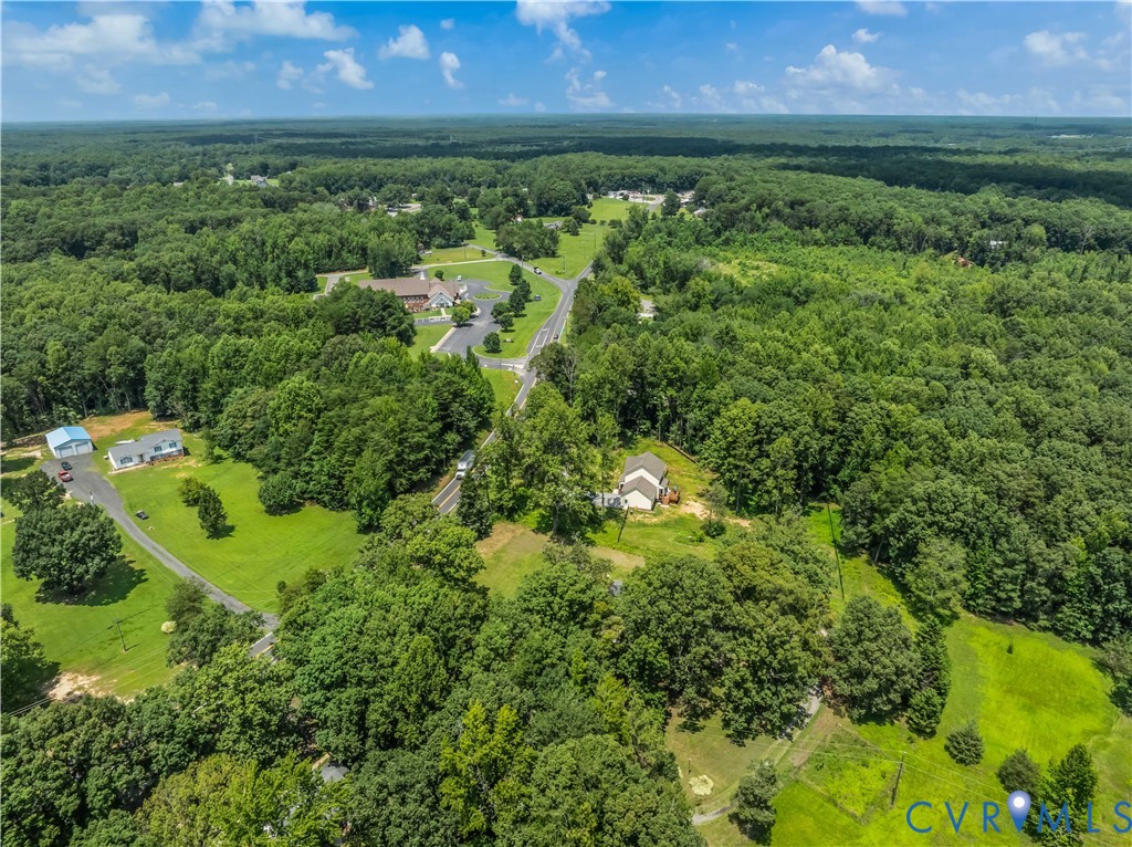 3179 Sandy Hook Road Sandy Hook, VA 23153 - Photo 4 of 36 an aerial view of a house with a yard