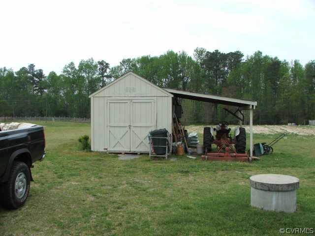 17270 Loving Union Road Disputanta, VA 23842 - Photo 5 of 7 a view of a house with backyard