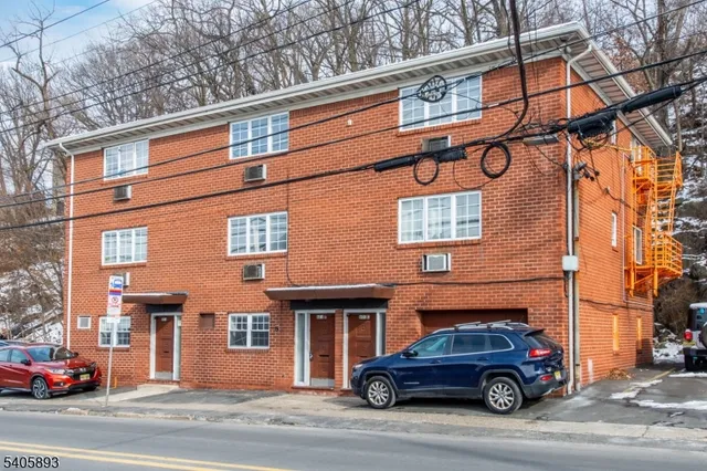 a car parked in front of a building