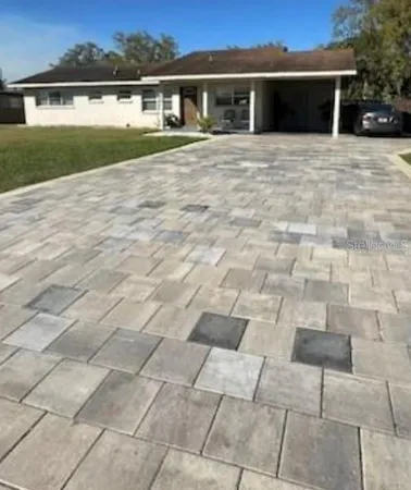 a view of house with yard