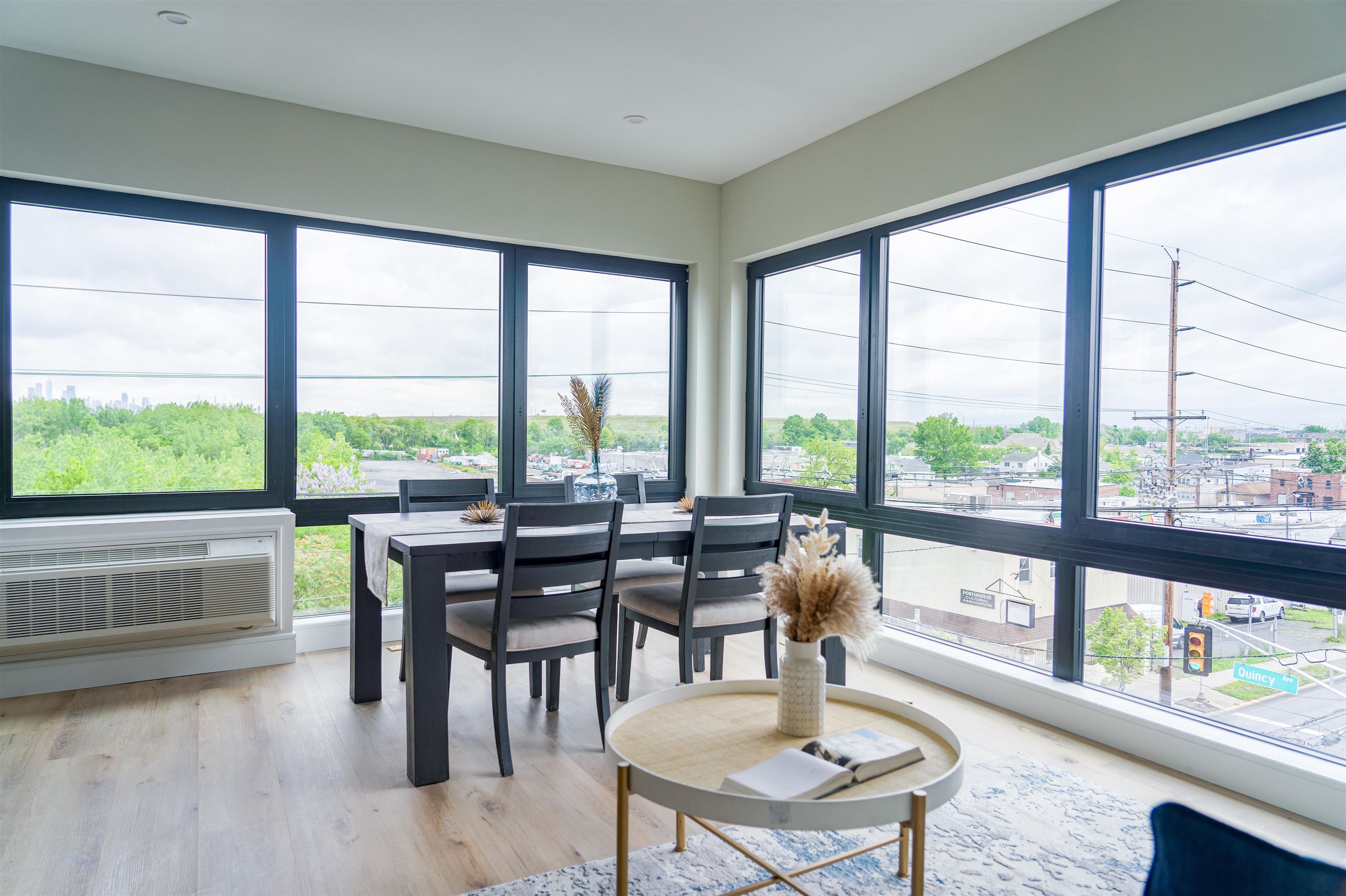457 Schuyler Avenue, Unit 209 Kearny, NJ 07032 - Photo 11 of 37 a view of a dining room with furniture window and wooden floor