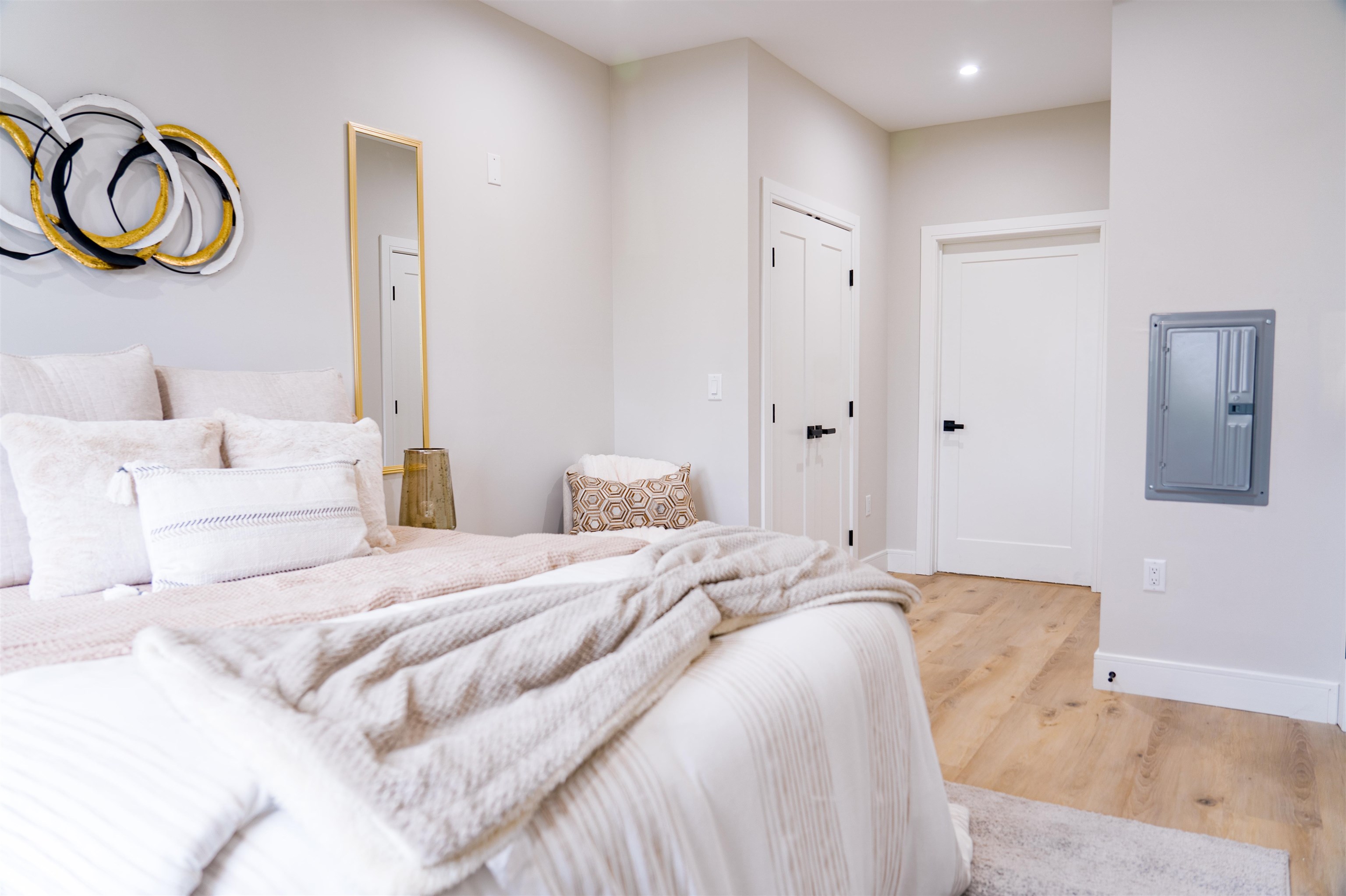 457 Schuyler Avenue, Unit 209 Kearny, NJ 07032 - Photo 18 of 37 a spacious bedroom with a bed and a chandelier