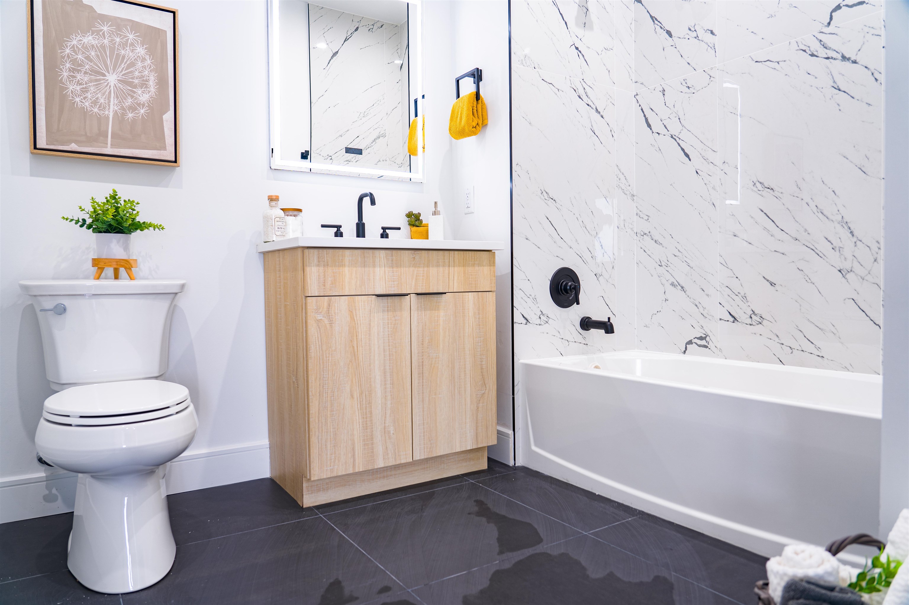 457 Schuyler Avenue, Unit 209 Kearny, NJ 07032 - Photo 23 of 37 a bathroom with a sink a toilet and a bathtub