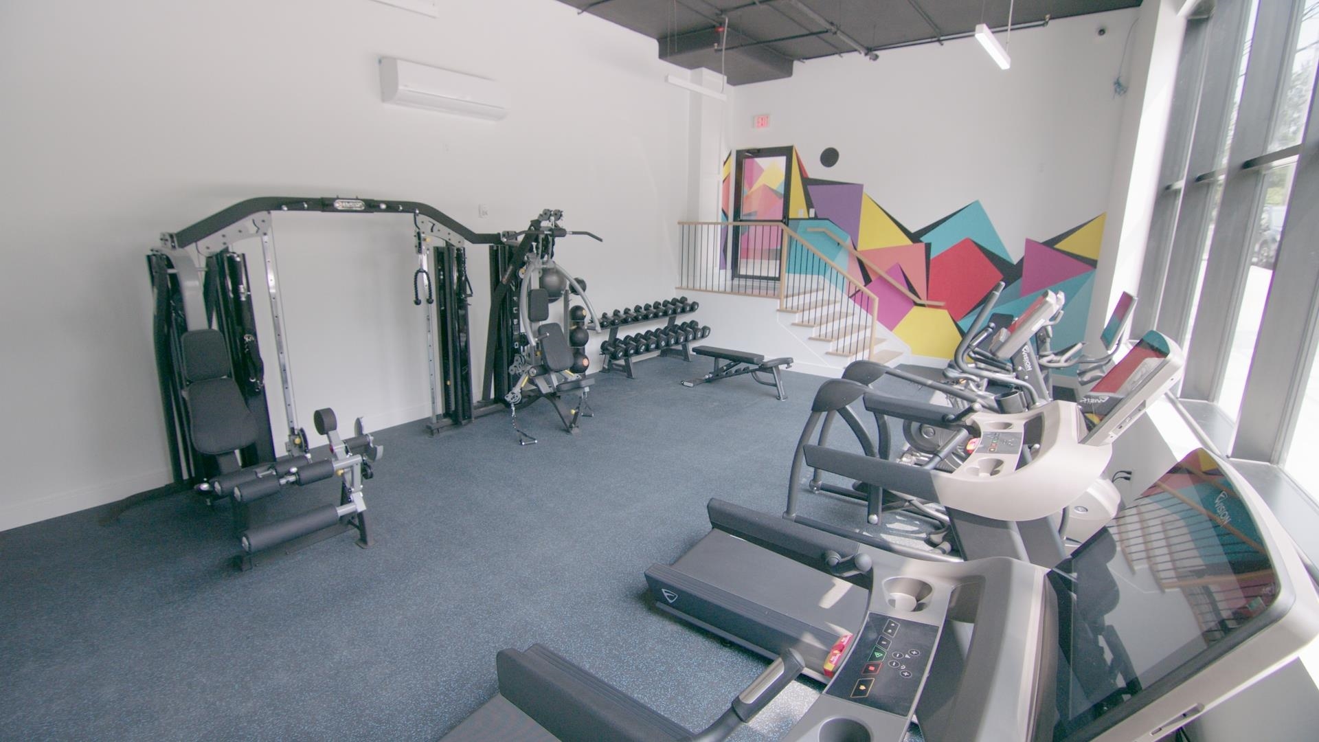 457 Schuyler Avenue, Unit 209 Kearny, NJ 07032 - Photo 26 of 37 a view of gym equipment with rug equipment