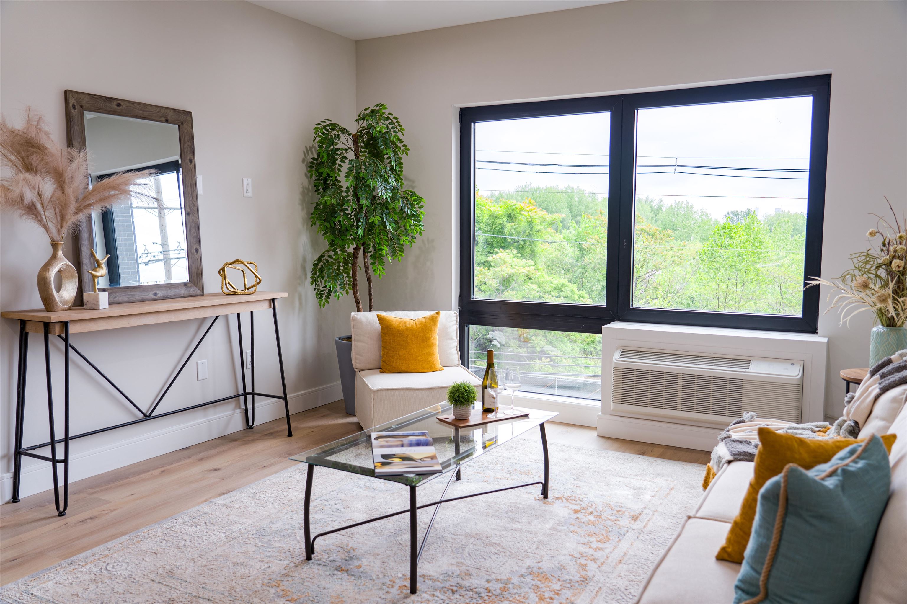 457 Schuyler Avenue, Unit 209 Kearny, NJ 07032 - Photo 3 of 37 a living room with furniture and a window