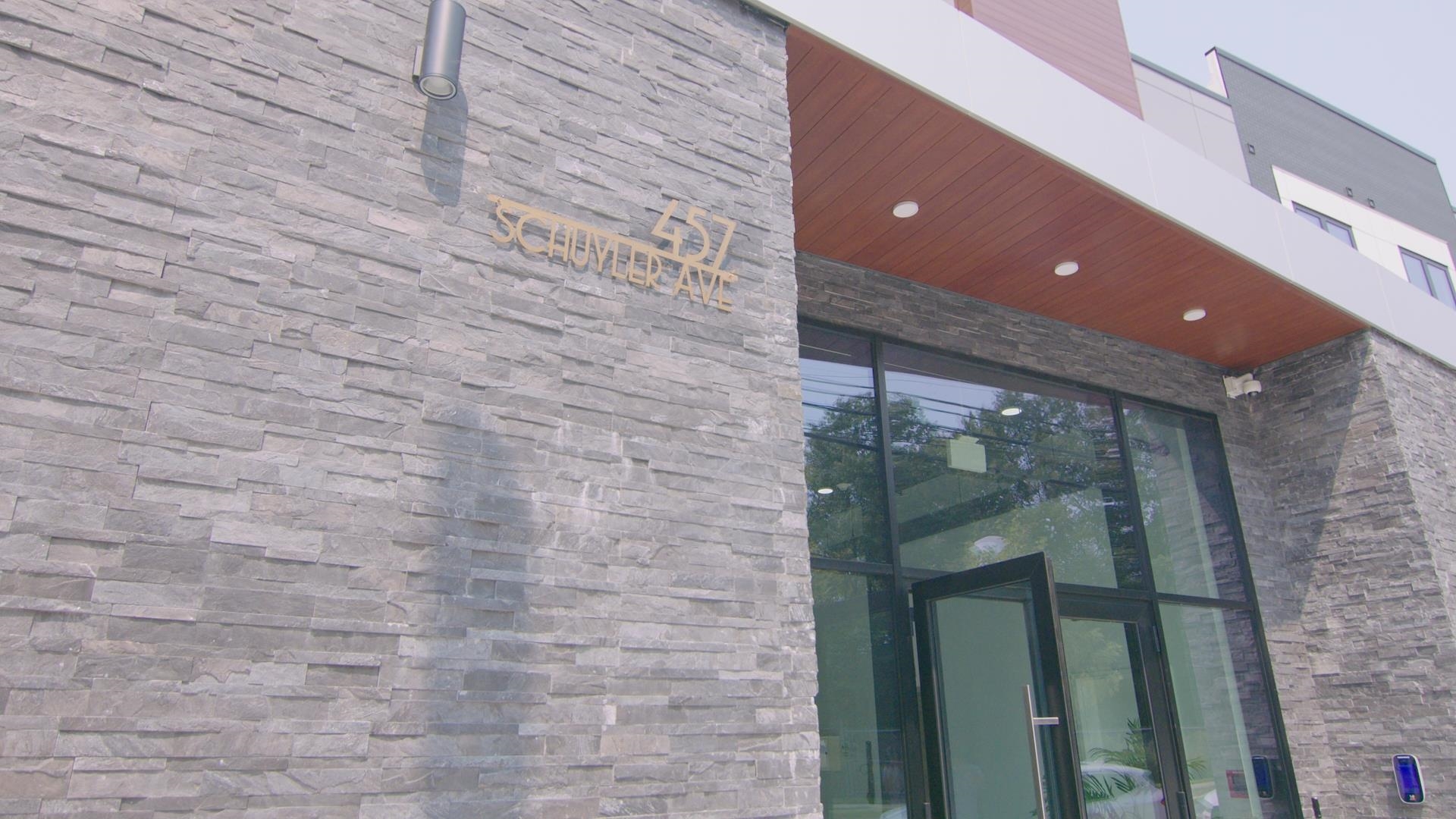 457 Schuyler Avenue, Unit 209 Kearny, NJ 07032 - Photo 35 of 37 a bathroom with a mirror