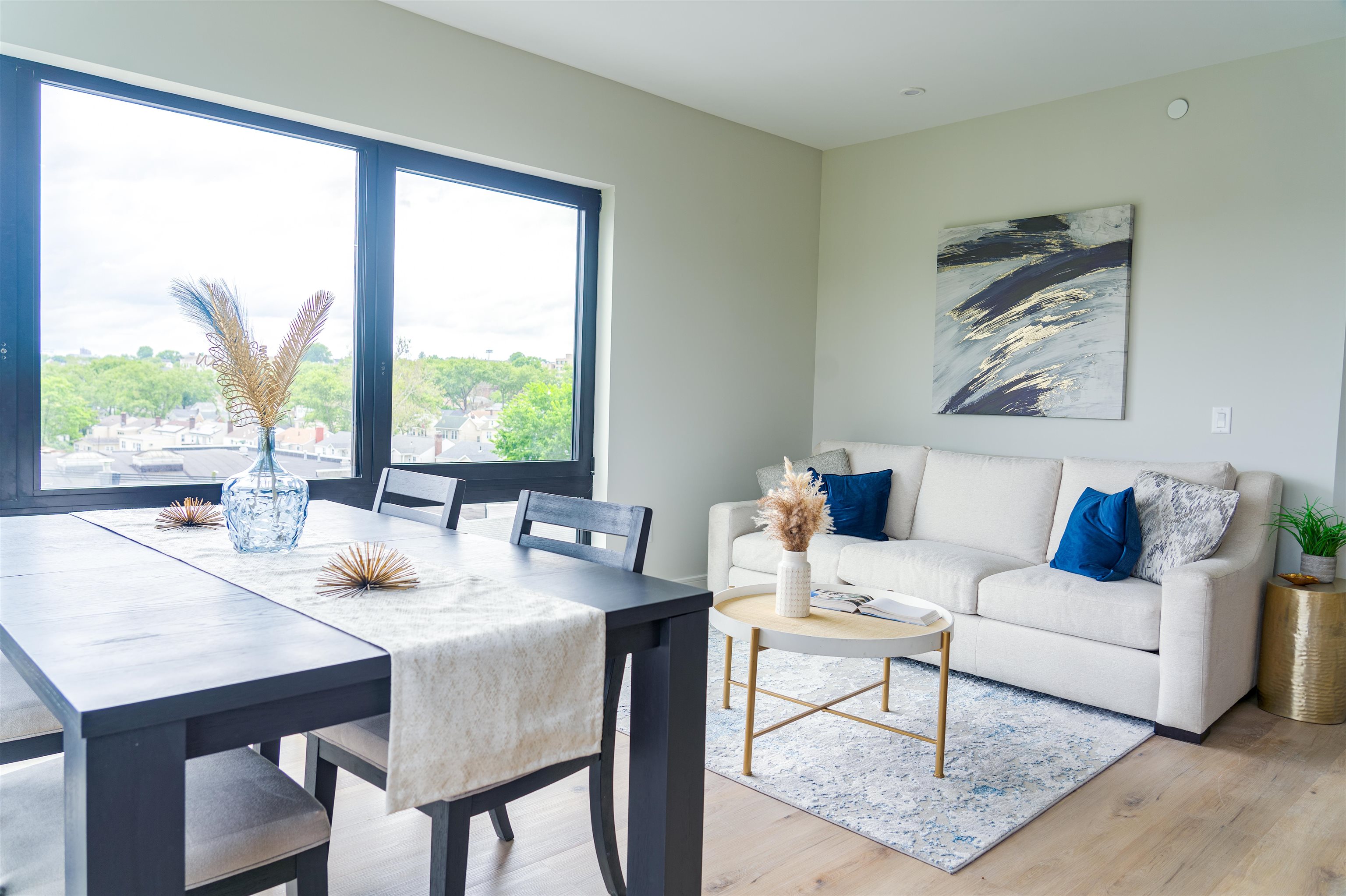 457 Schuyler Avenue, Unit 209 Kearny, NJ 07032 - Photo 5 of 37 a living room with furniture and a large window