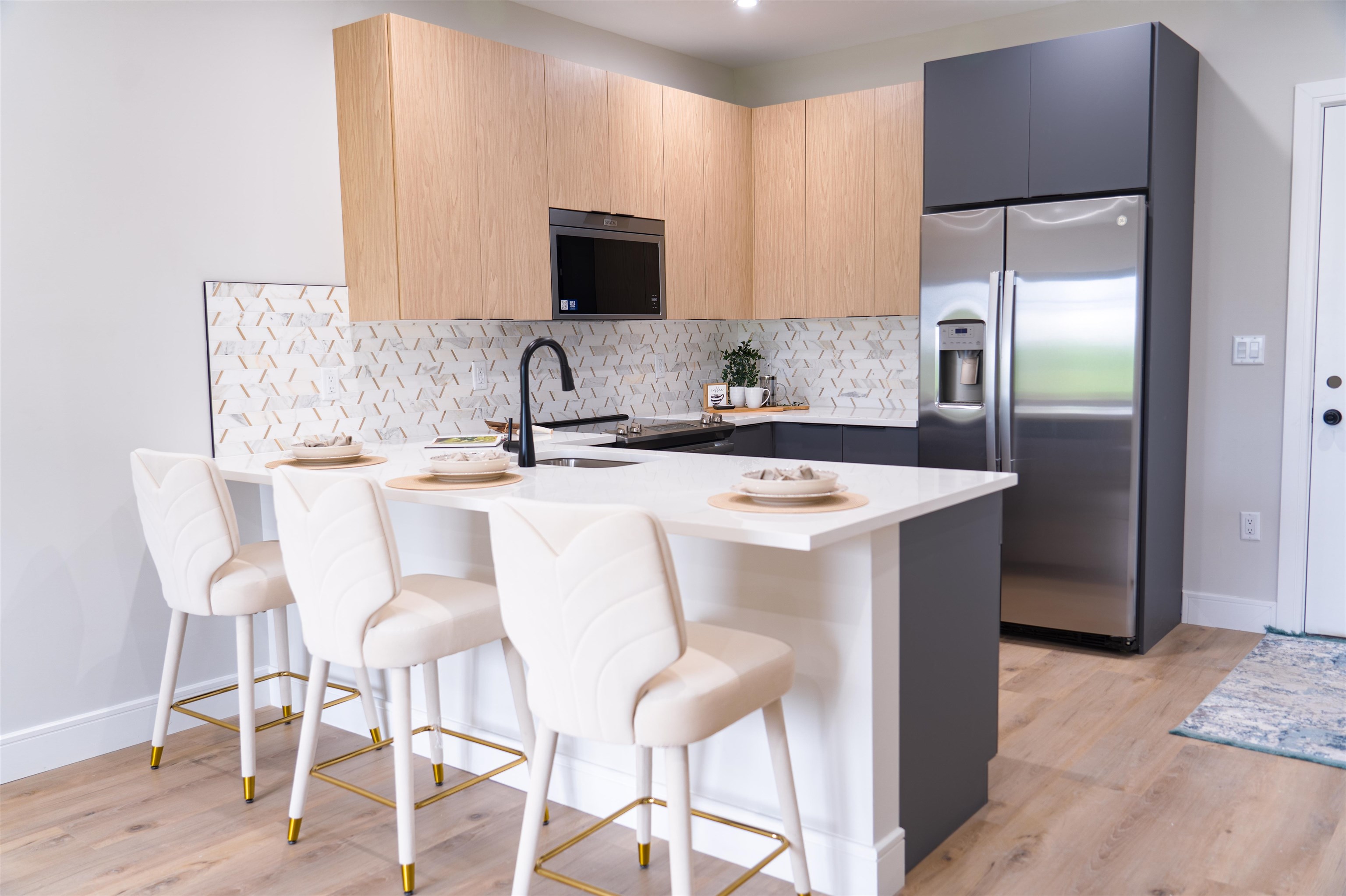 457 Schuyler Avenue, Unit 209 Kearny, NJ 07032 - Photo 8 of 37 a kitchen with stainless steel appliances granite countertop a sink and a refrigerator