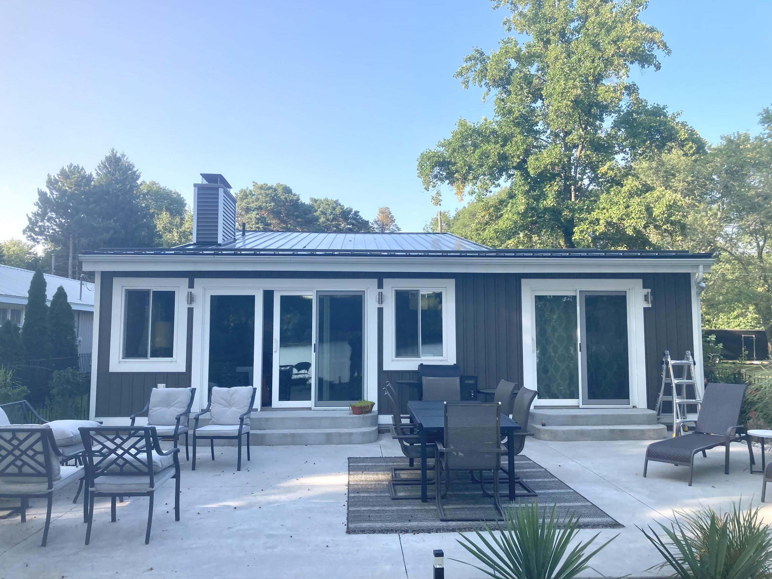 6959 Abrahamson Road Ludington, MI 49431 - Photo 36 of 54 summertime patio lake side