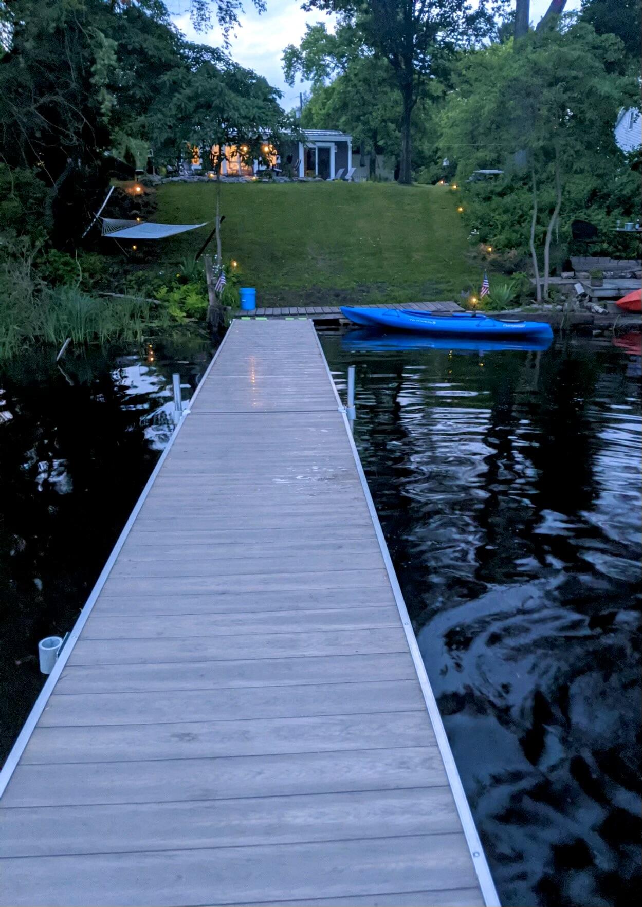 6959 Abrahamson Road Ludington, MI 49431 - Photo 40 of 54 night time dock photo