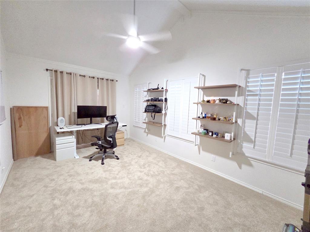3908 Denham Way Plano, TX 75023 - Photo 11 of 23 a view of a workspace with furniture and a bedroom