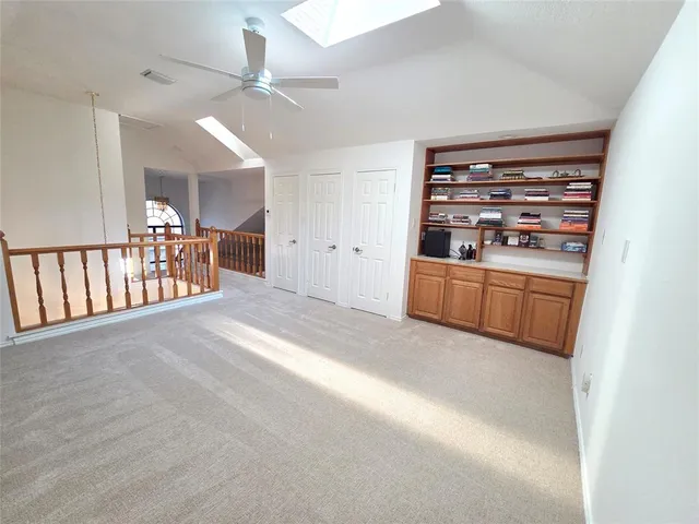 a view of a hallway with closet