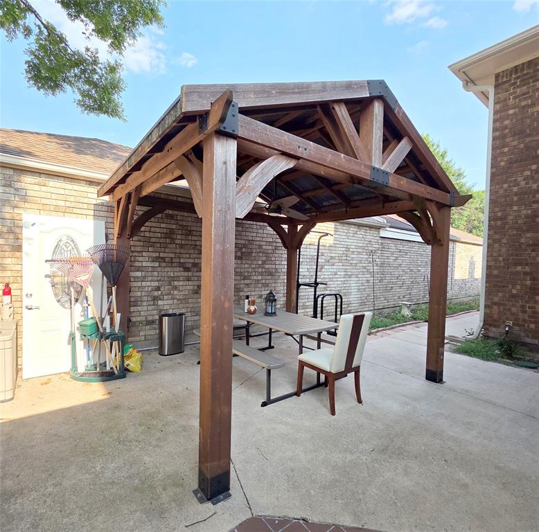3908 Denham Way Plano, TX 75023 - Photo 6 of 23 a view of a two chairs in the patio