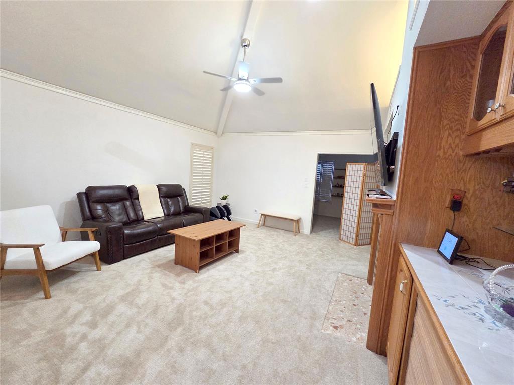 3908 Denham Way Plano, TX 75023 - Photo 9 of 23 a living room with furniture and a flat screen tv
