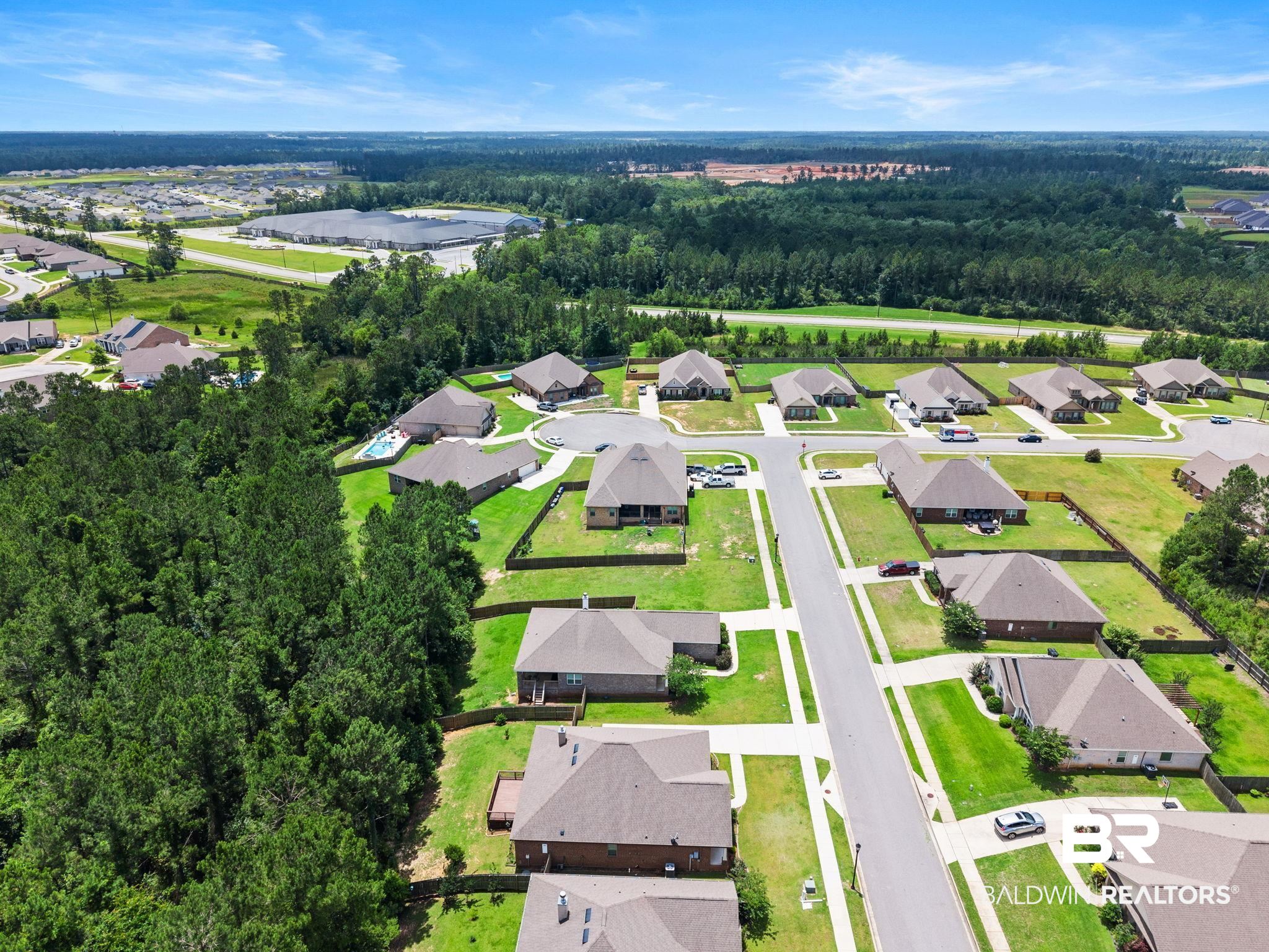 31350 Hoot Owl Road Daphne, AL 36527 - Photo 81 of 94 Residential neighborhood featuring single-story homes with shingle roofs and fenced backyards