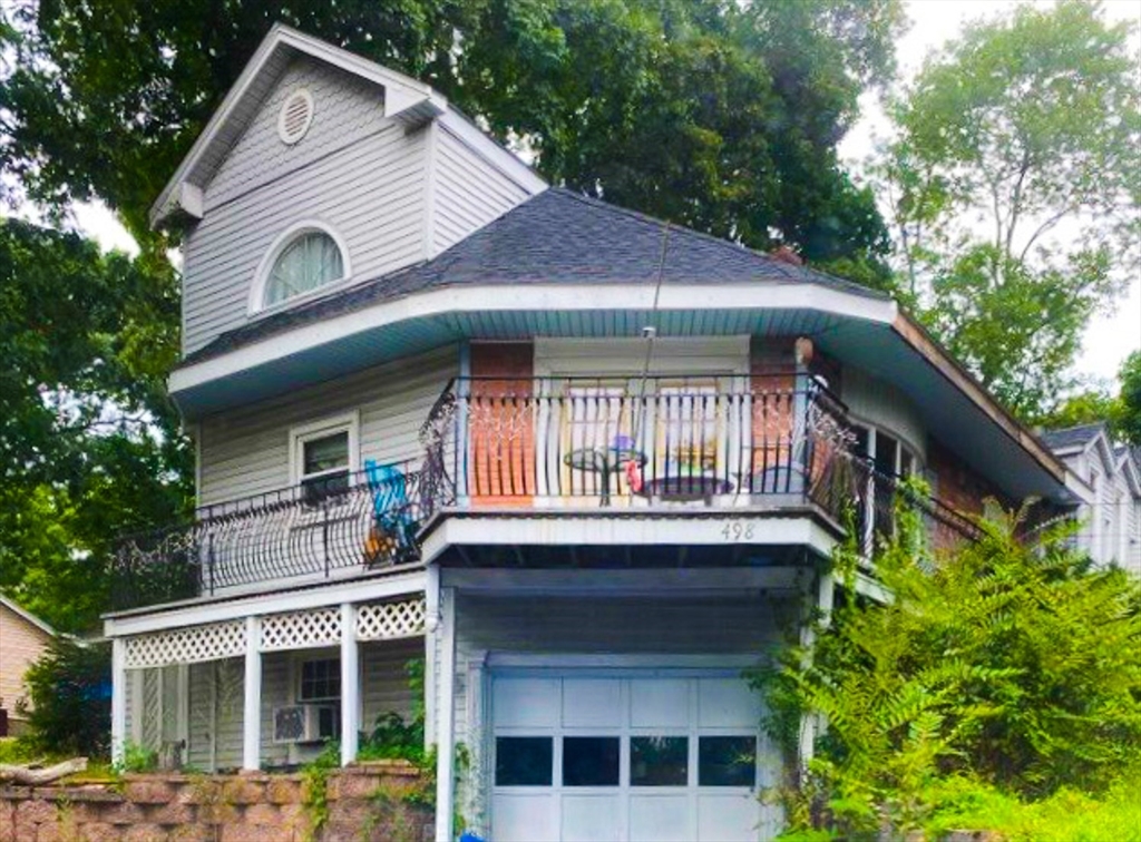 498 Middlesex Turnpike Billerica, MA 01821 - Photo 1 of 21 a front view of a house with garden