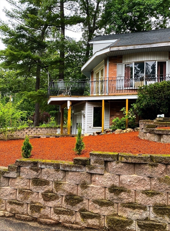498 Middlesex Turnpike Billerica, MA 01821 - Photo 7 of 21 a front view of a house with a yard