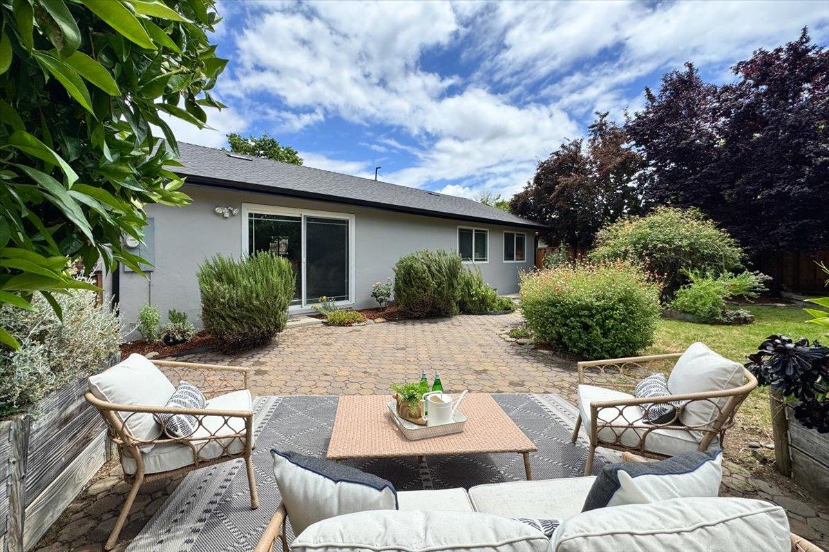 5459 Clovercrest Drive San Jose, CA 95118 - Photo 11 of 23 a view of backyard with outdoor seating a patio and plants