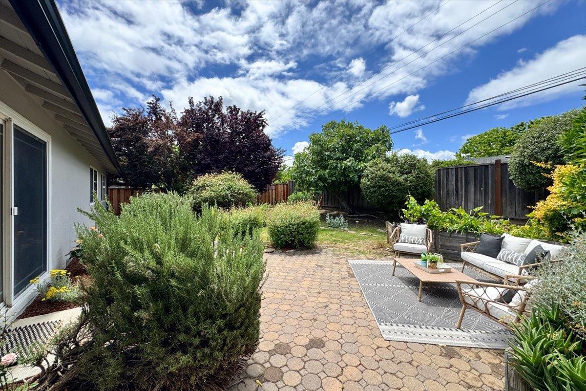 5459 Clovercrest Drive San Jose, CA 95118 - Photo 12 of 23 a view of a patio with couches table and chairs and potted plants