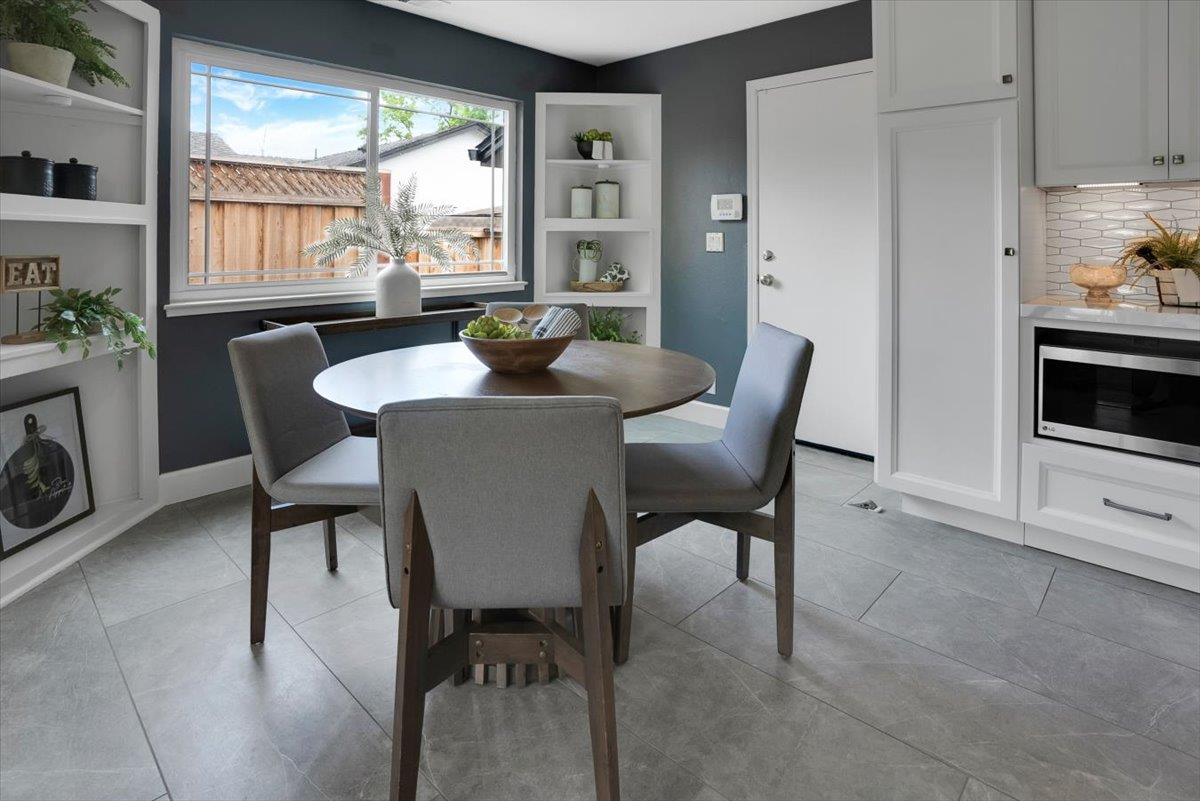5459 Clovercrest Drive San Jose, CA 95118 - Photo 14 of 23 a view of a dining room with furniture window and outside view