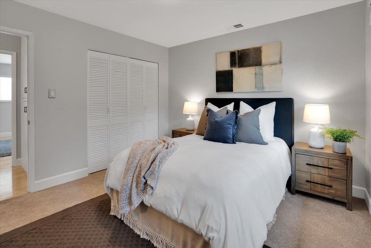 5459 Clovercrest Drive San Jose, CA 95118 - Photo 15 of 23 a bedroom with a bed and wooden floor