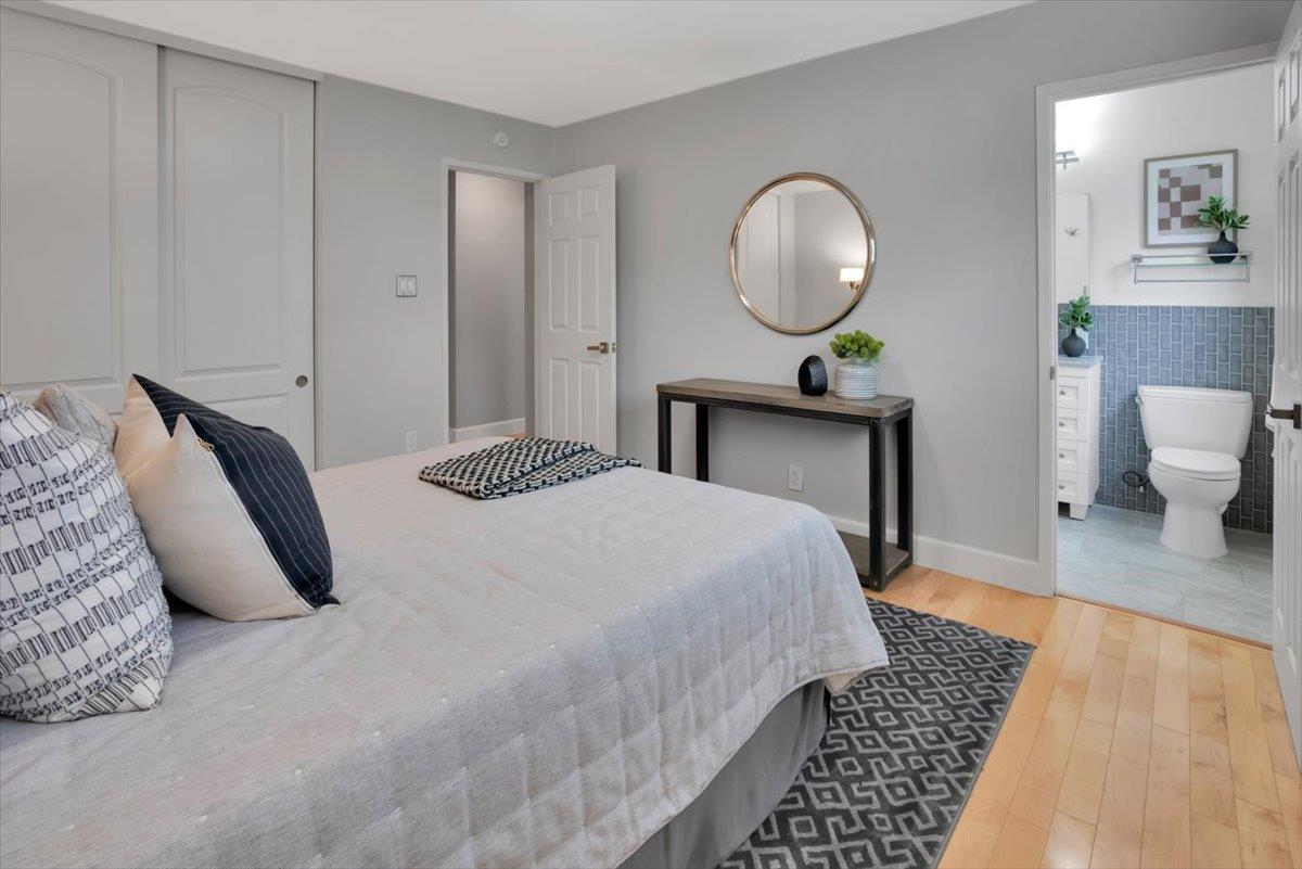 5459 Clovercrest Drive San Jose, CA 95118 - Photo 16 of 23 a bedroom with a bed and a chandelier