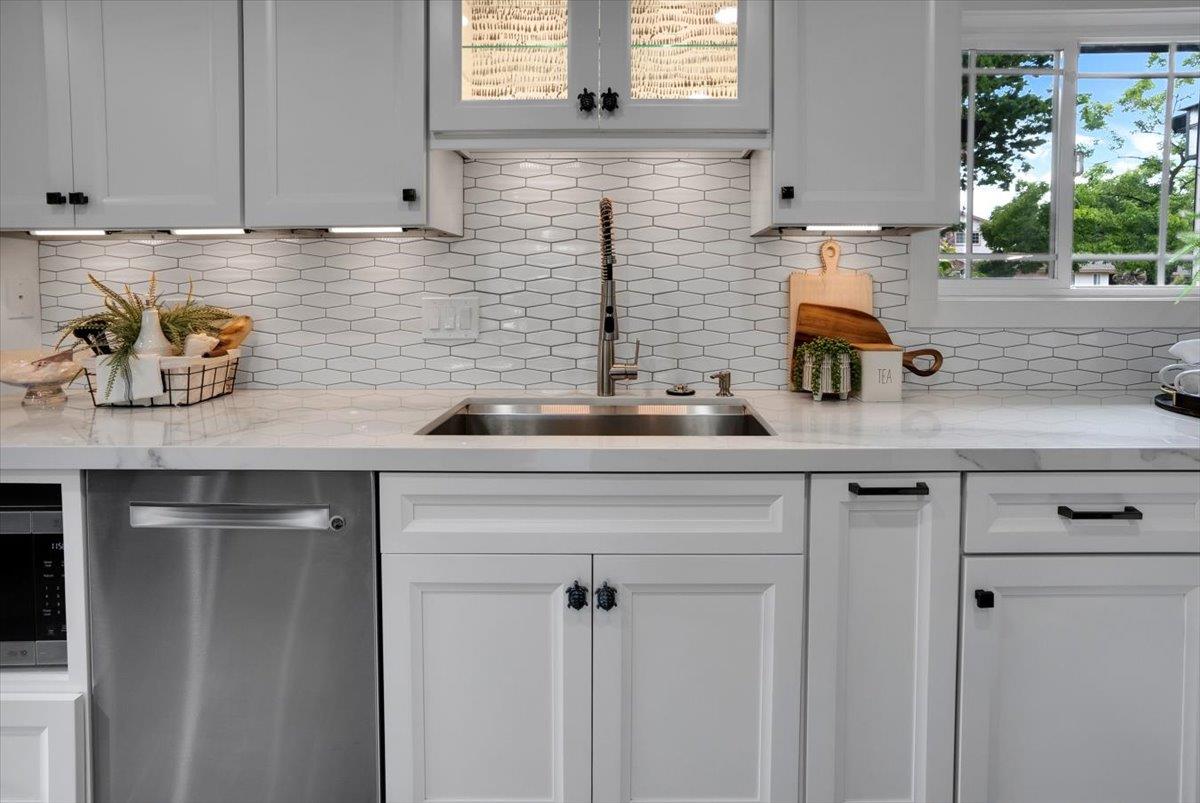 5459 Clovercrest Drive San Jose, CA 95118 - Photo 10 of 23 a kitchen with a sink and cabinets
